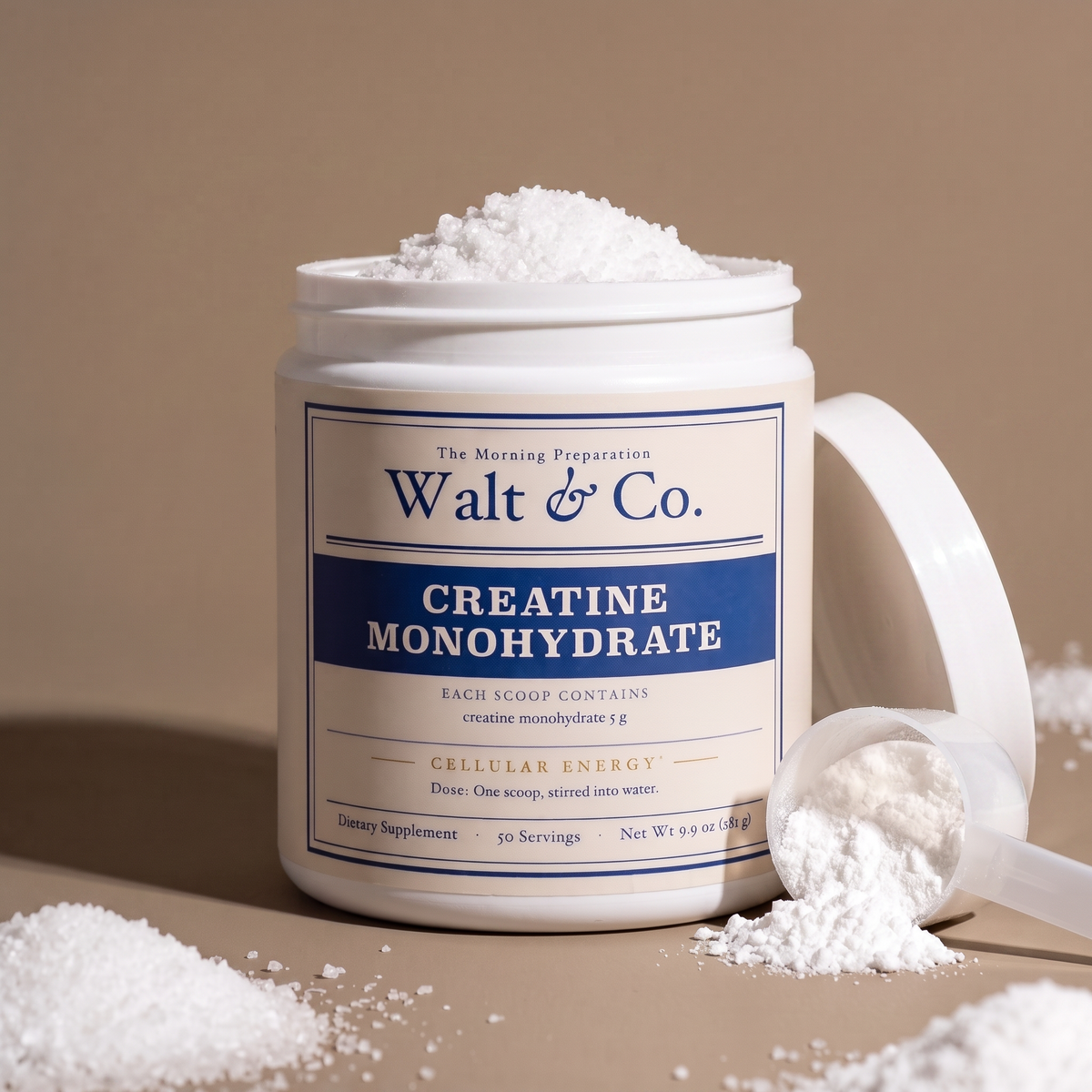 A tub of Walt & Co creatine and a glass of water on a sunlit kitchen counter